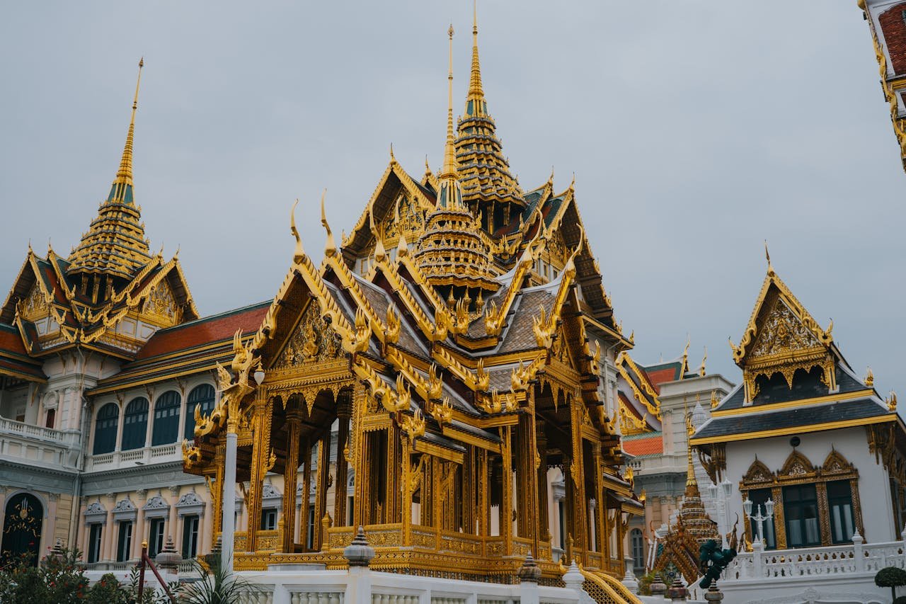 Glimpse the ornate architecture and golden elegance of Bangkok's Grand Palace.